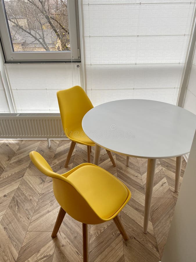 White Round Table and Yellow Chairs Stock Photo Image of armchair, loft 170140670