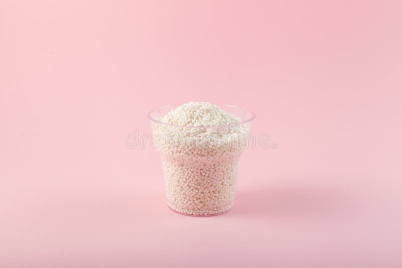 White Sago Pearls or Tapioca Pearl in Disposable Plastic Cup. Tapioca Ball or Boba for Bubble