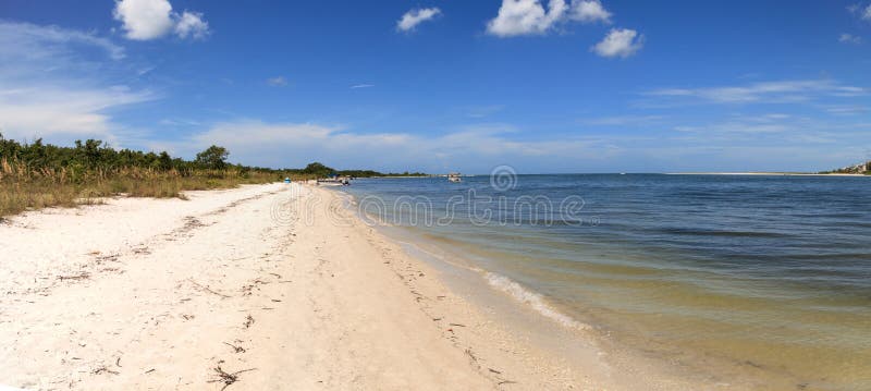 White sand beach path leading to the ocean at Lovers Key State Park Beach. In Bonita Springs, Florida stock photography