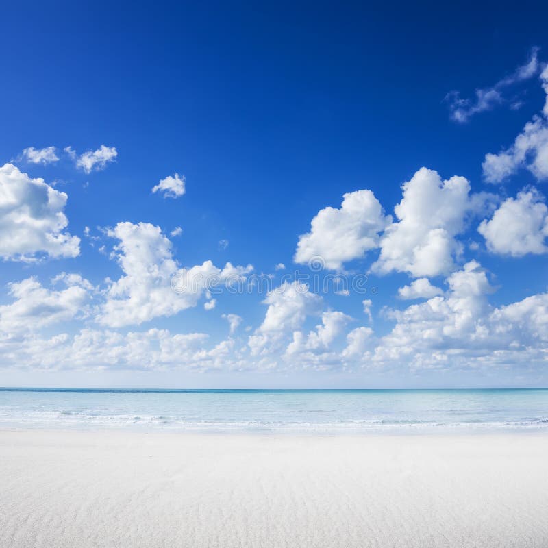 White sand beach, tropical ocean and blue sky