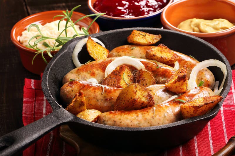 White Sausages with Potatoes Baked in a Frying Pan Stock Photo Image