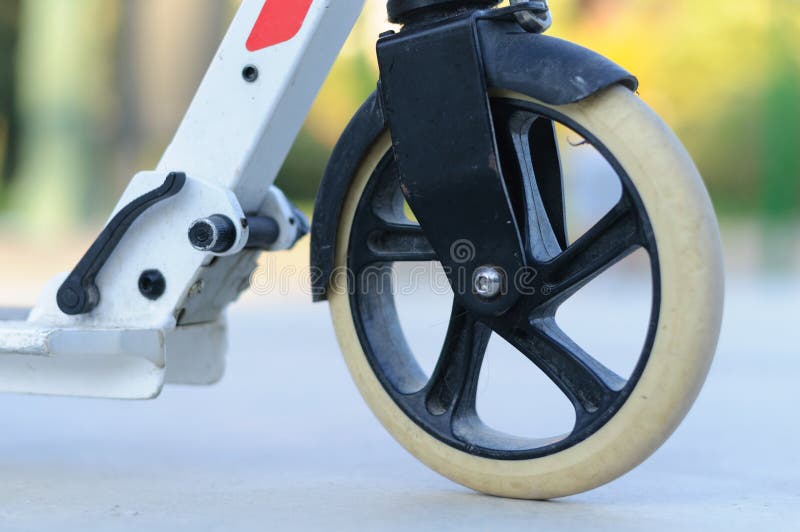 White Scooter Wheel Close Up in the Park Stock Image Image of
