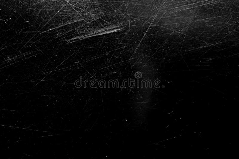 White scratches with scuffs on black royalty free stock images.