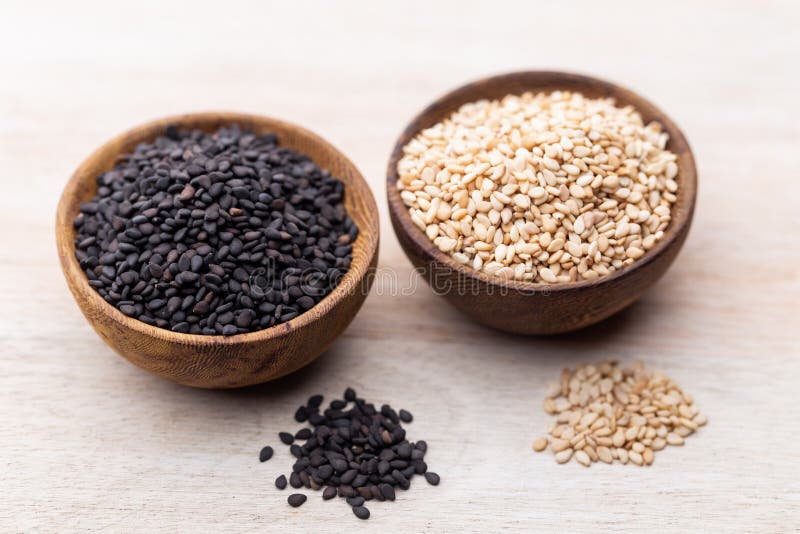 White Sesame and Black Sesame Seed on Wooden Bowl Stock Photo Image