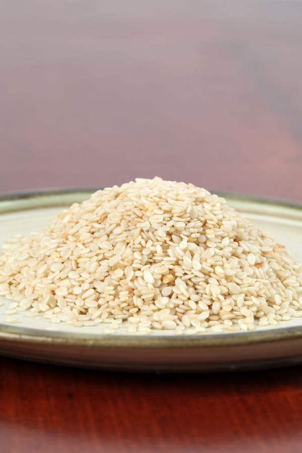 White sesame seeds stock image. Image of dried, heap 14589853