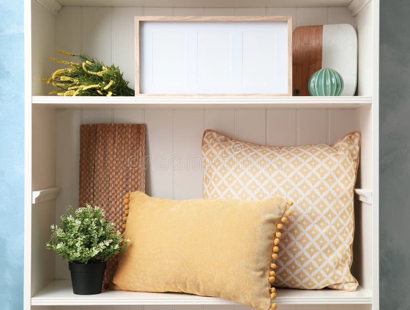 White Shelving Unit with Decorative Stuff Stock Image Image of potted
