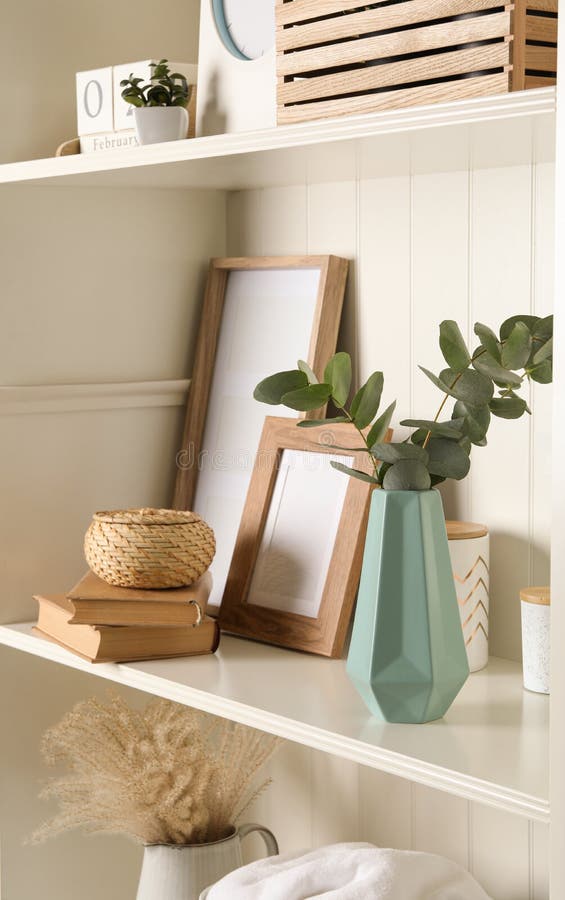 White Shelving Unit with Different Decorative Elements Stock Image