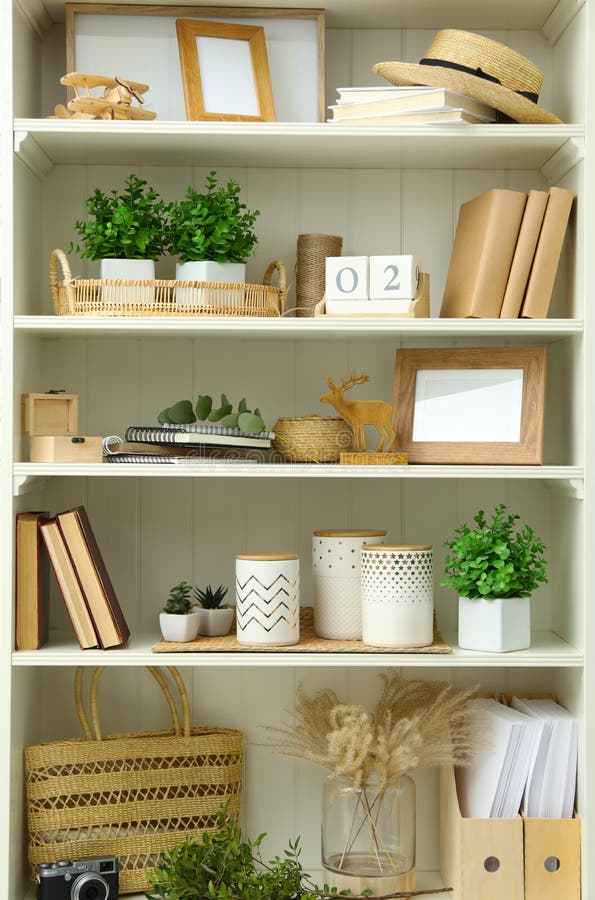 White Shelving Unit with Different Decorative Elements Stock Image