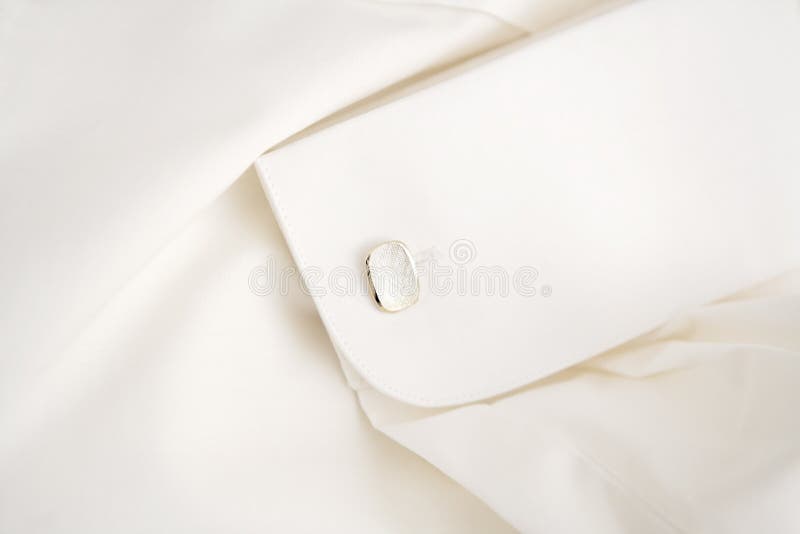 White shirt with cufflink royalty free stock photography White shirt with cufflink royalty free stock photography