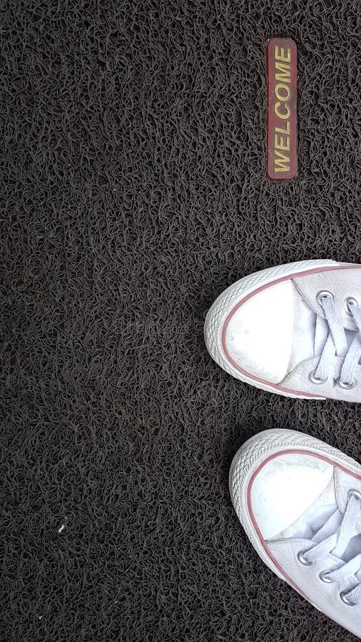 White shoes on carpet stock photo. Image of carpet 78059012