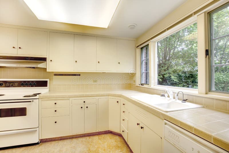 White simple old kitchen interior in American historical house.