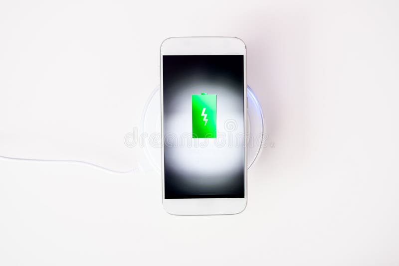 White Smartphone Charged by Wireless Charger Stock Image Image of