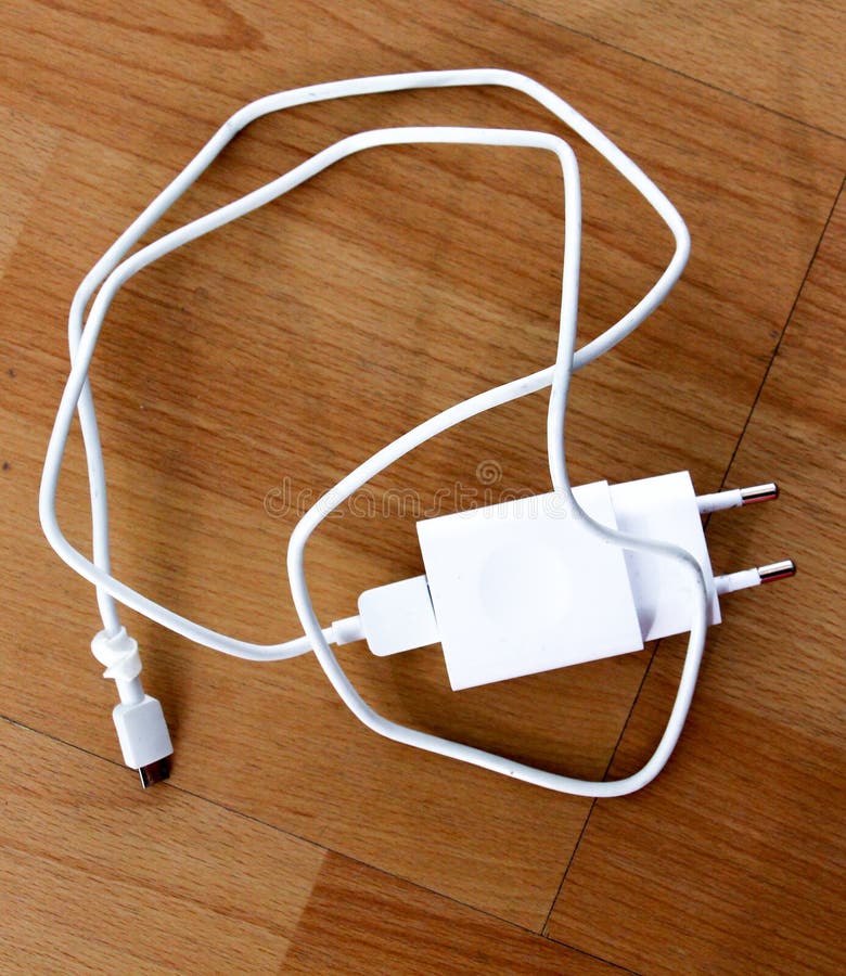 white smartphone charger on wood background royalty free stock photos white smartphone charger on wood background royalty free stock photos