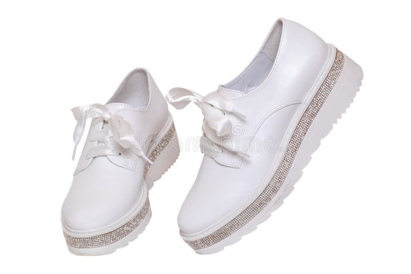 White Sneaker Isolated. Close-up of a Pair White Elegant Stylish Female  Leather High-heeled Sport Shoes Isolated on a White Stock Photo - Image of  isolated, elegant: 158090096