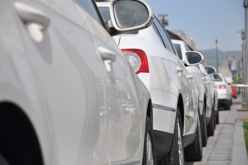 White sport cars parked