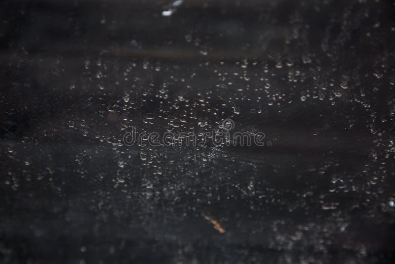 White Spots on Black Glass for Texture and Design Stock Photo Image