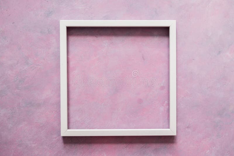 White square picture frame mock-up with copy space for yout text or image on top of pink background stock photography White square picture frame mock-up with copy space for yout text or image on top of pink background stock photography