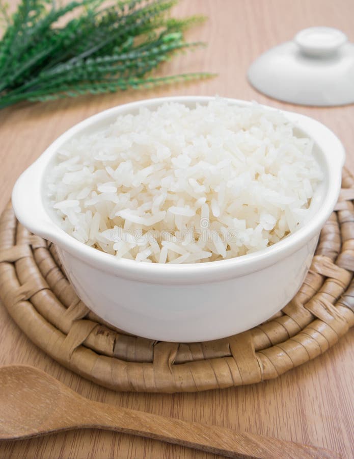 White steamed rice in bowl stock photo. Image of spoon 49338434