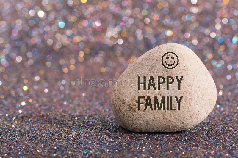 Happy family on stone stock photo. Image of backdrop - 117351258