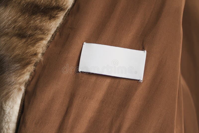 brown coat with white fur lining