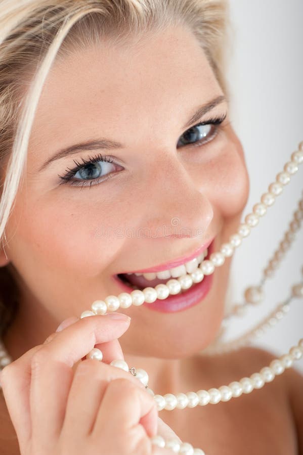 White strong teeth and pearls