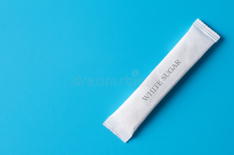 White Sugar Packets on a Blue Background Stock Photo Image of food