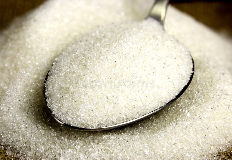 White sugar on the spoon stock image. Image of white 89642699