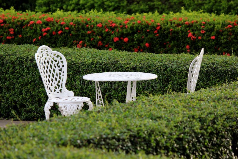 White table and chair in garden