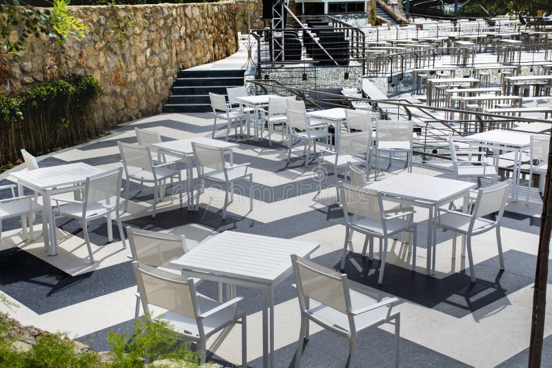 White Tables And Chairs.Outdoor Restaurant Stock Image Image of