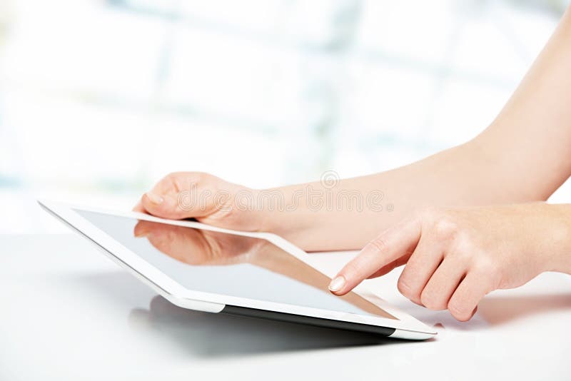 White Tablet with a Blank Screen in the Hands Stock Photo Image of