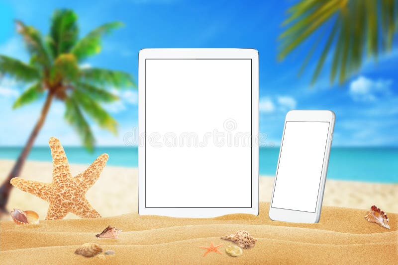 White tablet and smart phone with isolated white screen for mockup. Summer on beach, sea, sand, blue sky, palm, starfish and shell