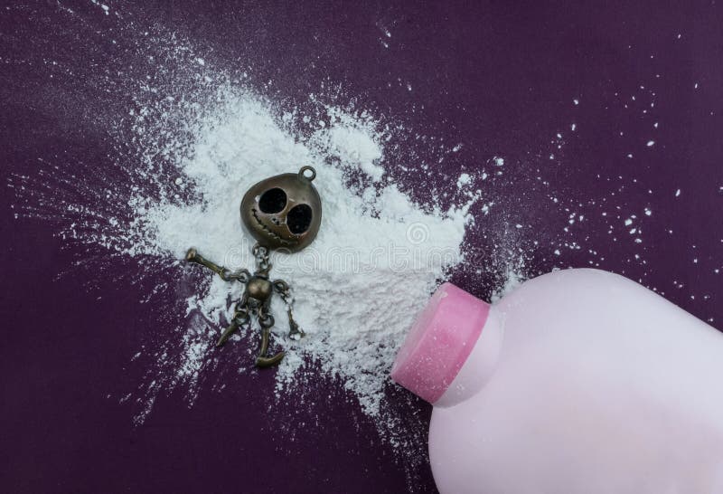 White talcum powder with skeleton toy stock photos White talcum powder with skeleton toy stock photos