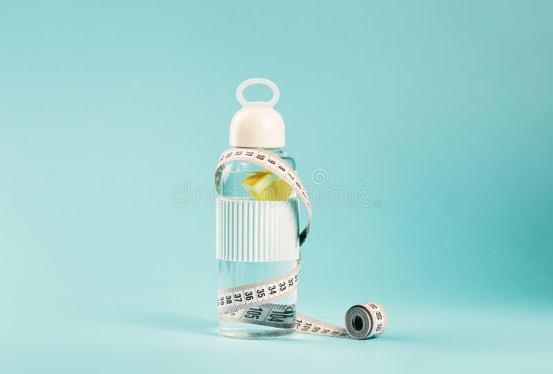 A Tape Measure and a Water Bottle Stock Photo - Image of lifestyle