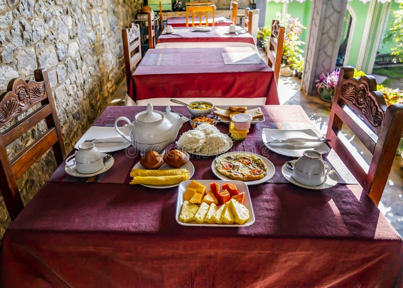 White Teapot on the Table Set for Breakfast at a Party on the Island of