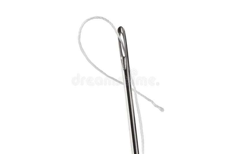 A white thread runs through the eye of the needle, separating it from the white background. royalty free stock photos