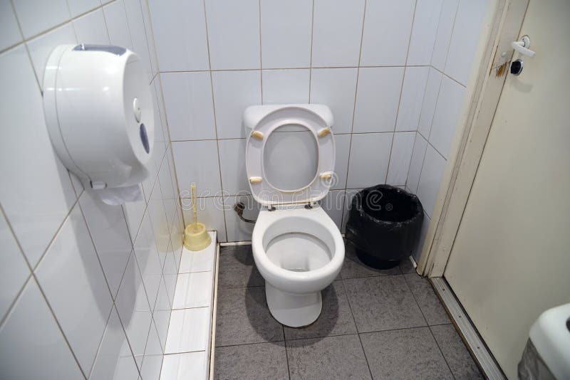White Toilet in a Public Restroom Stock Image Image of single