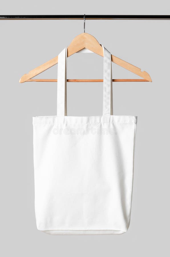 Download White Tote Bag Mockup Hanging On A Clothes Hanger Stock ...