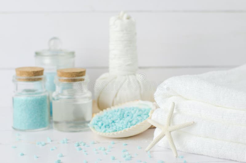 White towel with aromatherapy spa tools