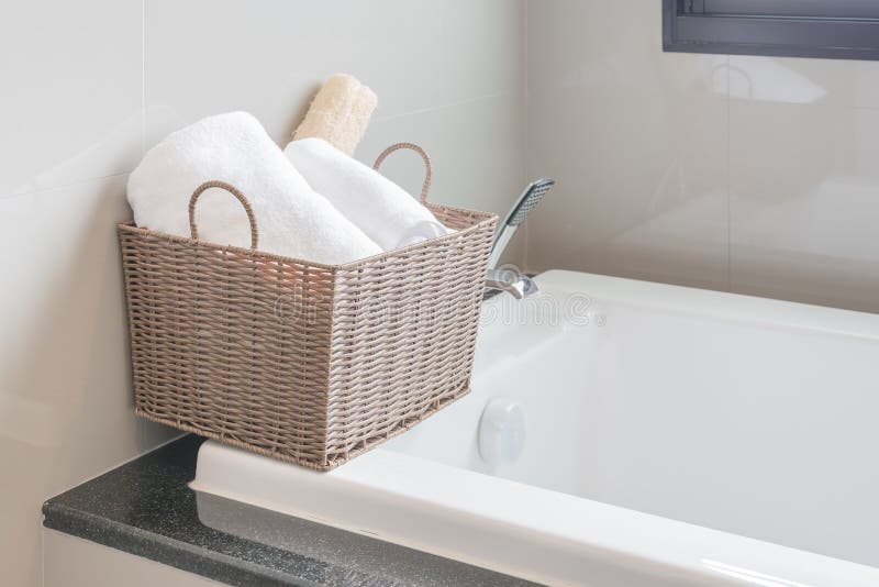 White Towel in Basket on Bath Tub Stock Image Image of decoration
