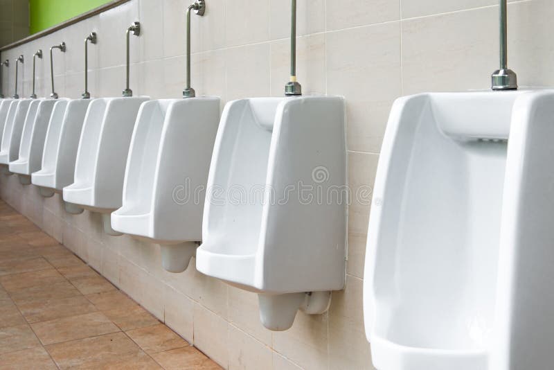 White Urinal in Men`s Bathroom. Stock Image Image of white, room