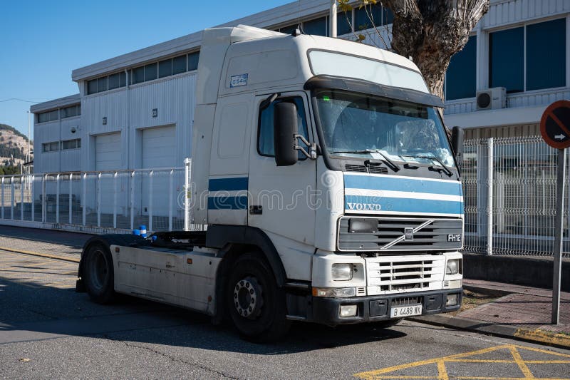 New, white Volvo FMX heavy duty truck for construction parked on a