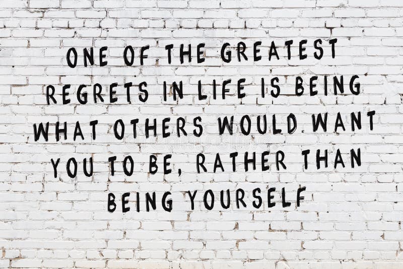 White Wall and Black Inscription of Sensible Quote on it Stock Photo