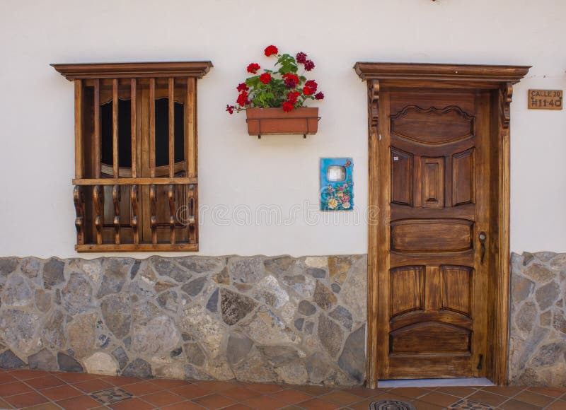 White wall with brown door stock photo. Image of architecture 192989754