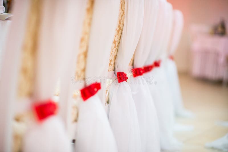 White wedding decor on chair