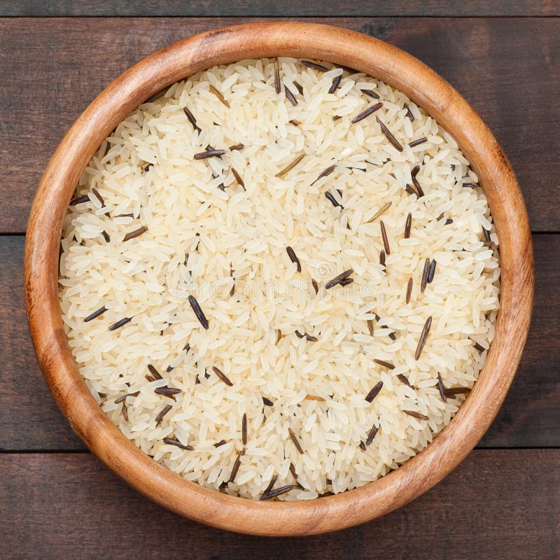 White and Wild Rice in Wooden Bowl on Table Stock Image - Image of meal
