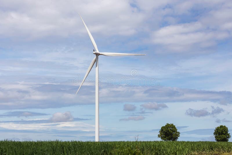 White wind turbines alternative renewable energy from nature in wind power station under blue sky backgroun stock photography White wind turbines alternative renewable energy from nature in wind power station under blue sky backgroun stock photography