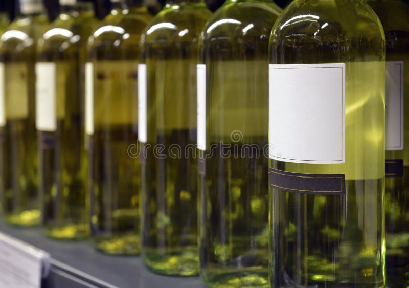 White wine in bottles stock image. Image of stack, wine 33452375