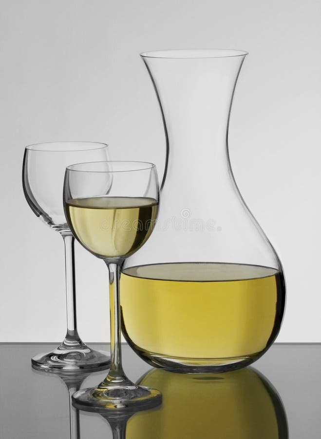Two glasses of white wine stock photo. Image of bubbles 11377136
