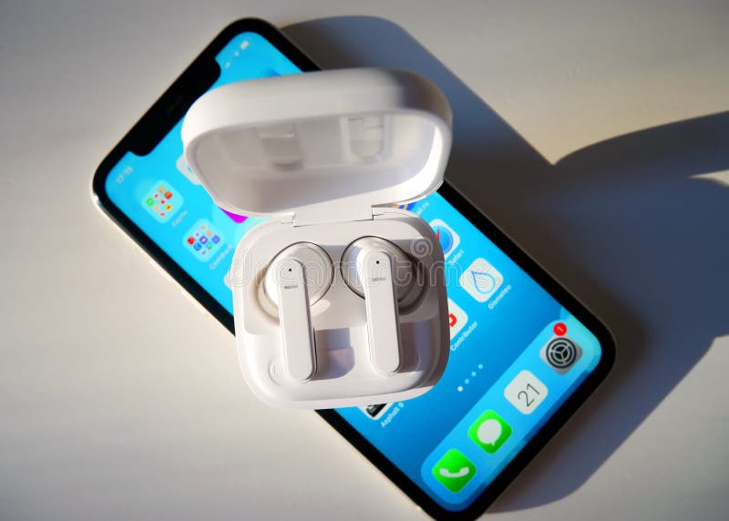 White Wireless Headphones. the Case of TWS Headphones is Made of White
