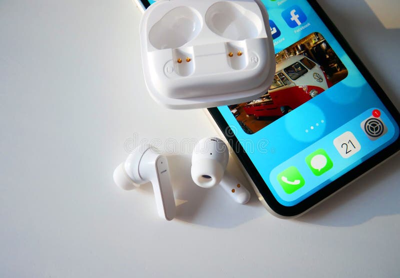 White Wireless Headphones. the Case of TWS Headphones is Made of White
